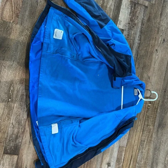 Columbia outgrow interchangeable, two jackets and one boys size extra large